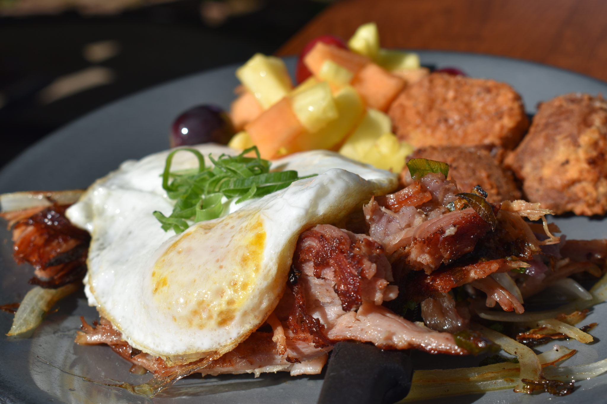 Fried eggs, ham, and potatoes