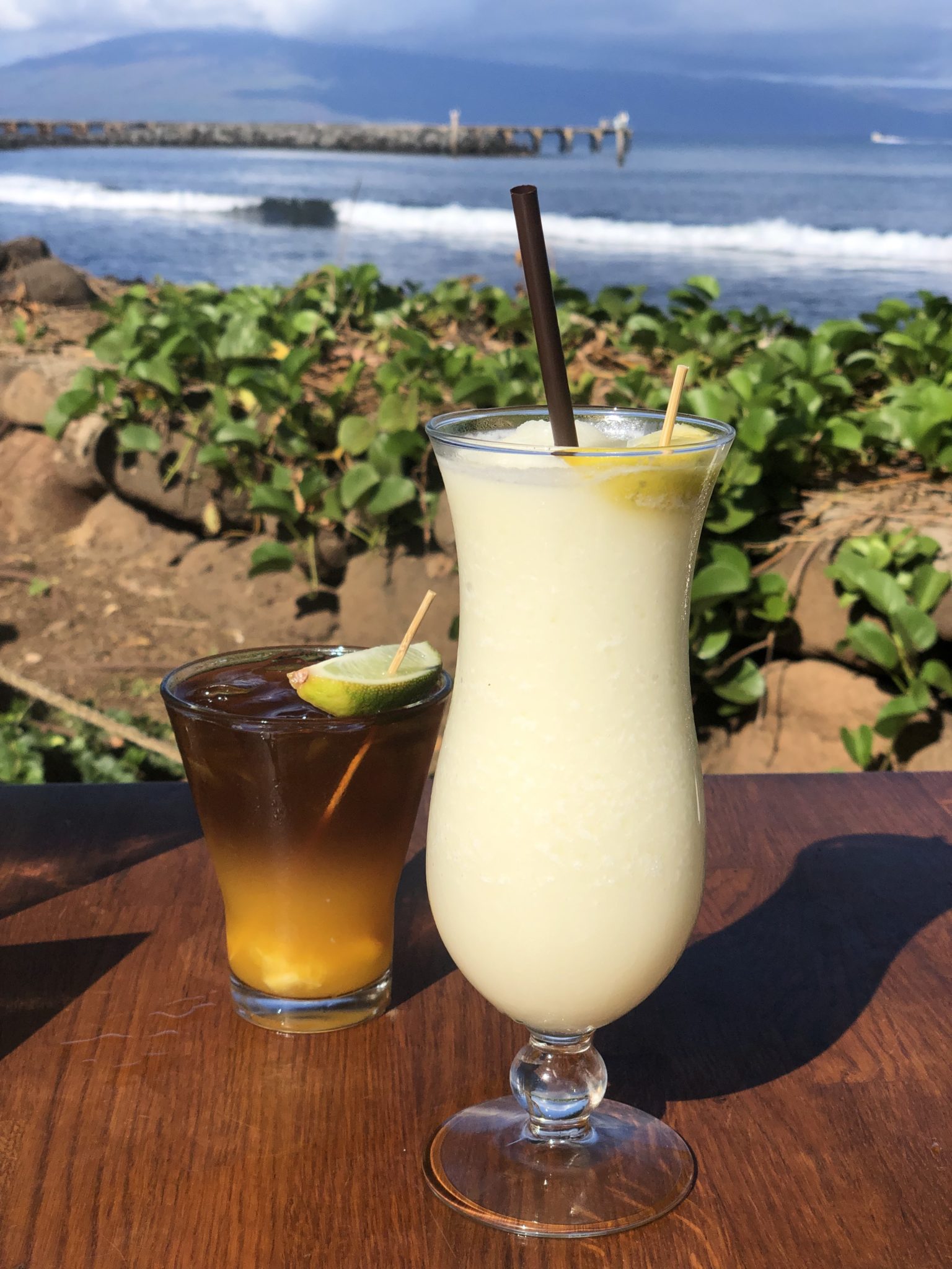 Drinks on table, in front of beautiful ocean view