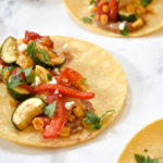 Roasted veggie and refried bean tacos
